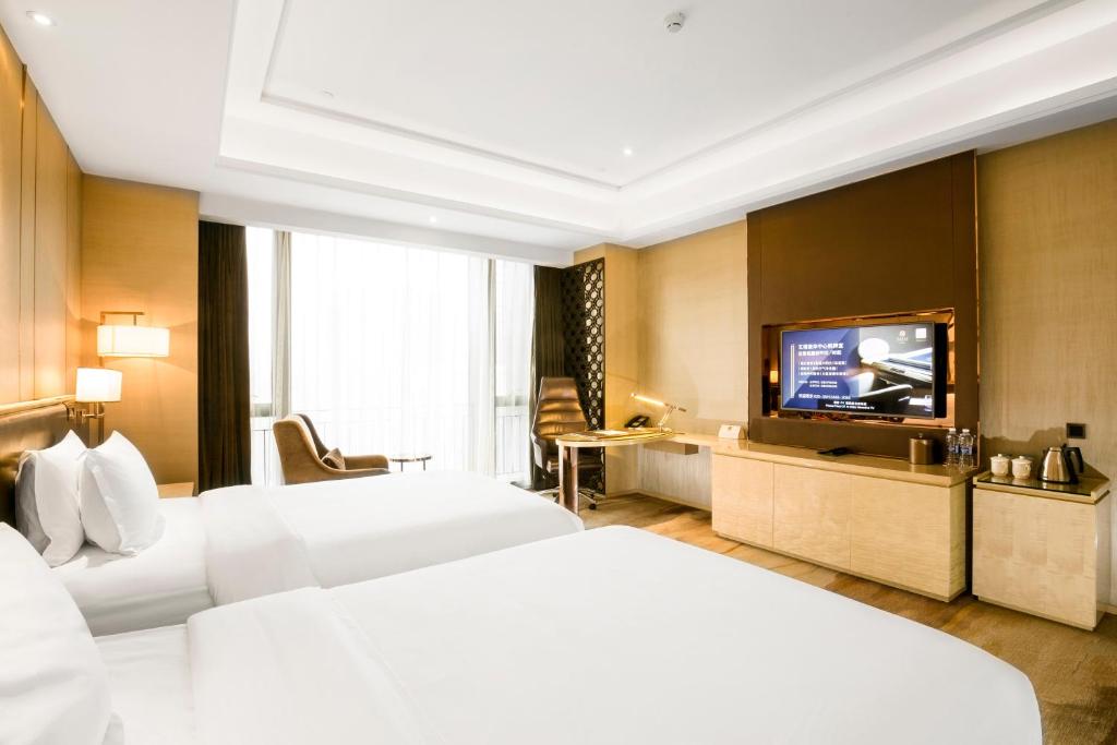 Двухместный (Двухместный номер бизнес-класса с 2 отдельными кроватями) отеля Vaperse Hotel, Гуанчжоу