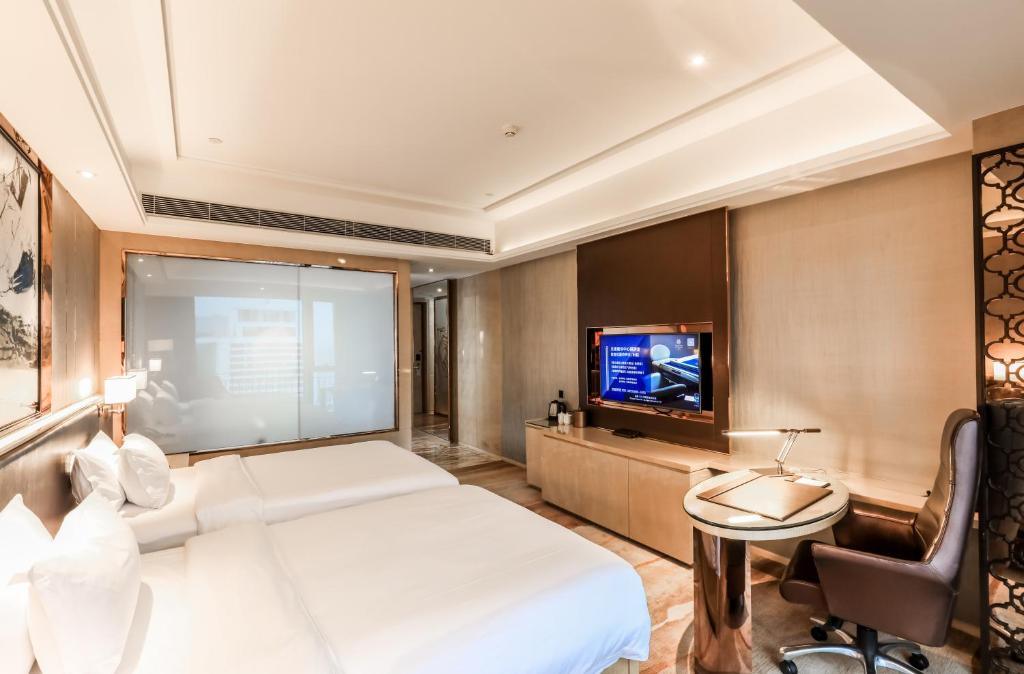 Двухместный (Представительский двухместный номер с 2 отдельными кроватями) отеля Vaperse Hotel, Гуанчжоу