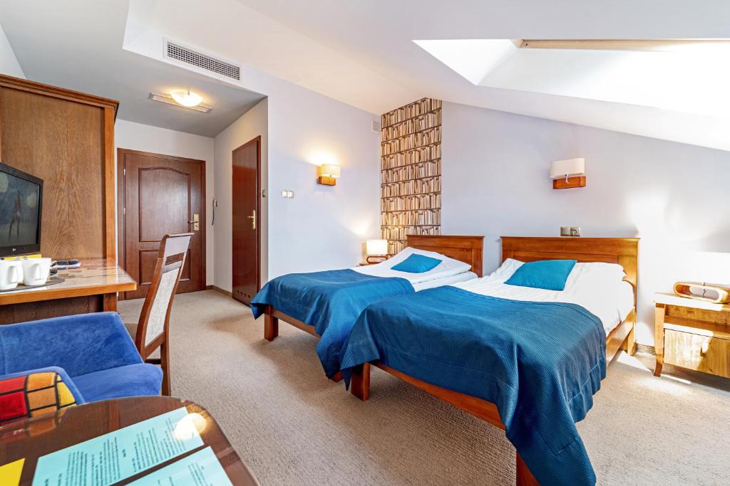 Двухместный (Двухместный номер с 1 кроватью или 2 отдельными кроватями) отеля Hotel Młyn Aqua Spa Biblioteka, Эльблонг