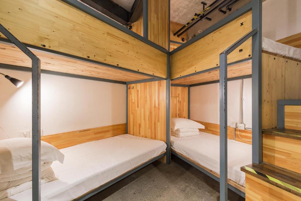 Номер (Кровать в общем 8-местном номере для женщин) хостела UniLoft Hostel Dalian, Далянь