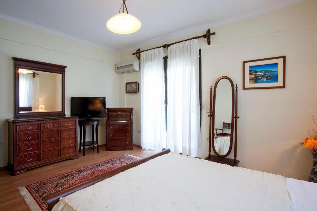 Двухместный (Классический двухместный номер с 1 кроватью или 2 отдельными кроватями и видом на сад) отеля Kymata Hotel, Платамонас