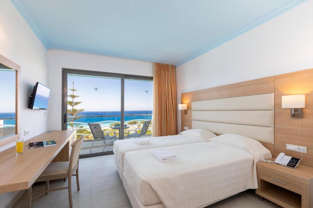 Двухместный (Улучшенный двухместный номер с 2 отдельными кроватями и видом на море) курортного отеля Blue Horizon, Ялиссос
