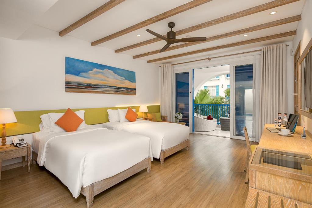 Сьюит (Полулюкс с 2 отдельными кроватями и террасой) курортного отеля Risemount Resort Danang, Дананг