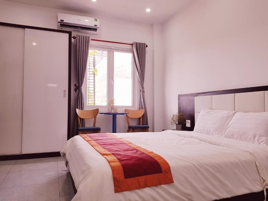 Двухместный (Двухместный номер с 1 кроватью и балконом (для 2 взрослых и 1 ребенка)) отеля 7S Hotel Nha Trang Ruby, Нячанг