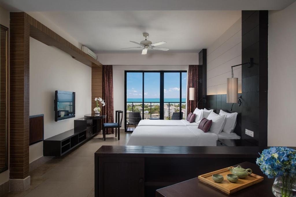 Двухместный (Улучшенный двухместный номер с 2 отдельными кроватями и видом на море) отеля Lihe Hotel, Санья
