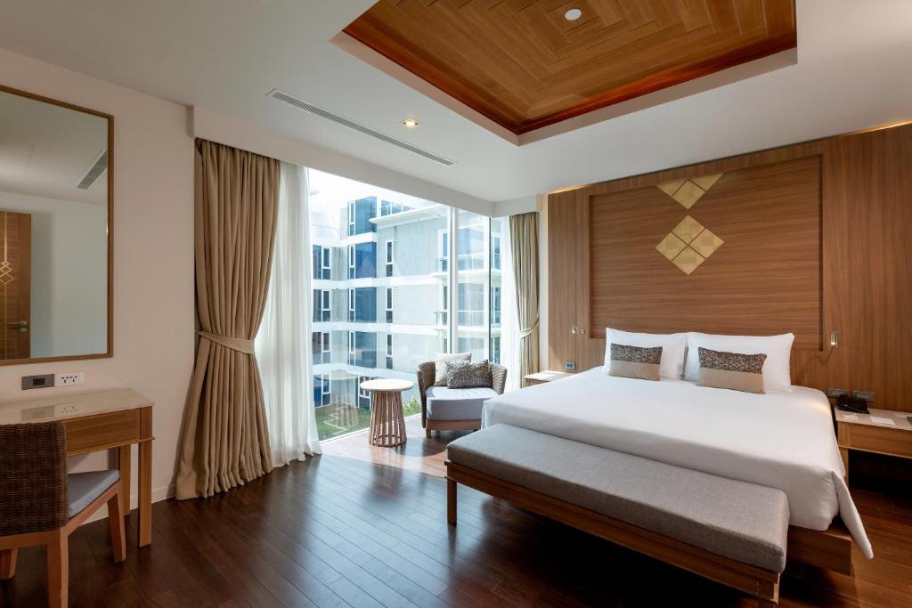 Сьюит (LL2B: Люкс Residence с 2 спальнями и балконом) курортного отеля Grand West Sands Resort & Villas Phuket, Пхукет