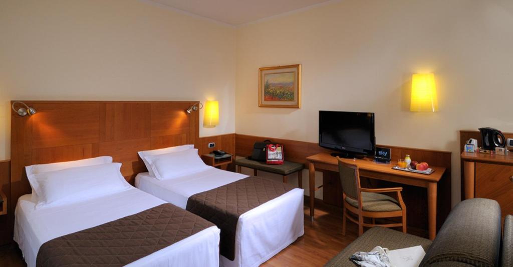 Двухместный (Двухместный номер с 2 отдельными кроватями) отеля Best Western Hotel Master, Брешиа