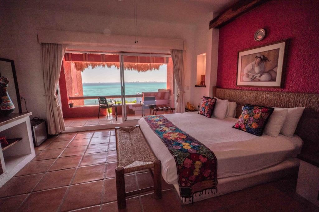 Сьюит (Люкс с кроватью размера «king-size» и видом на океан) отеля Casa de los Suenos, Исла-Мухерес