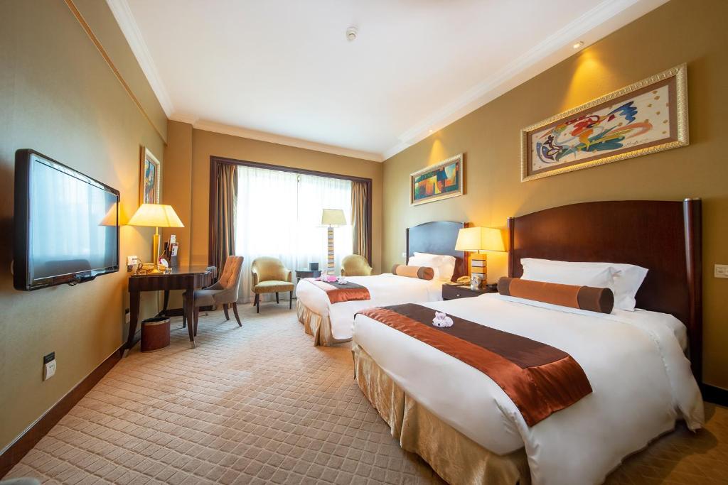 Двухместный (Двухместный номер Делюкс с 2 отдельными кроватями) отеля Grand International Hotel, Гуанчжоу