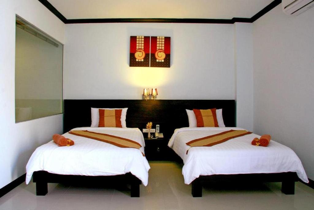 Двухместный (Двухместный номер Делюкс с 1 кроватью или 2 отдельными кроватями) отеля Tanawit, Хуахин