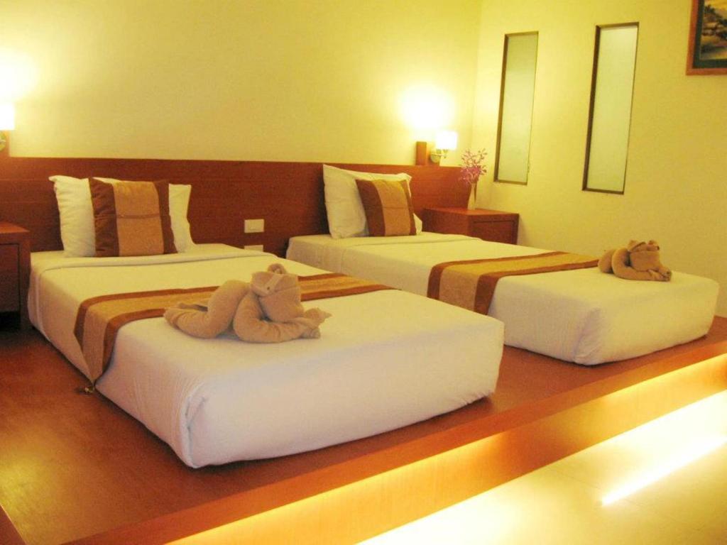 Двухместный (Улучшенный двухместный номер с 1 кроватью или 2 отдельными кроватями) отеля Tanawit, Хуахин