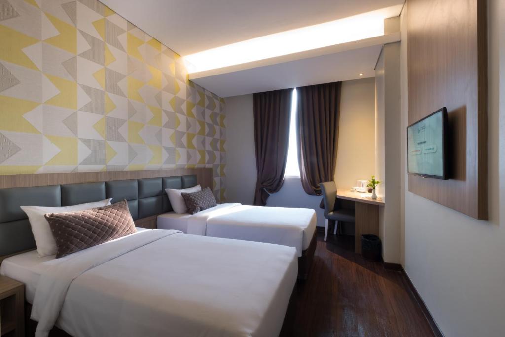 Двухместный (Двухместный номер Делюкс с 2 отдельными кроватями) отеля Hotel 88 ITC Fatmawati Jakarta, Джакарта