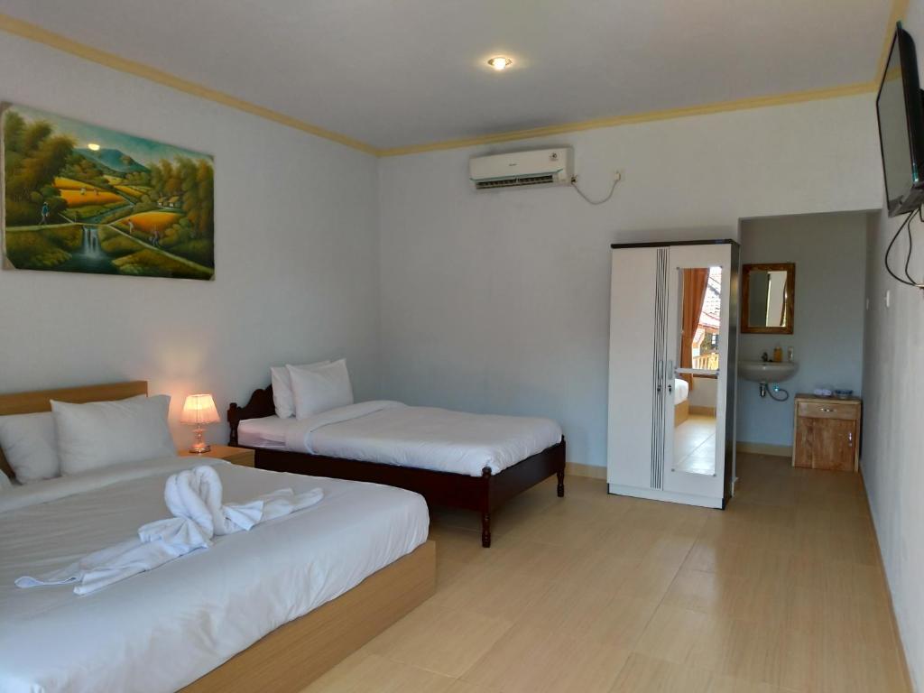 Двухместный (Улучшенный двухместный номер с 1 кроватью или 2 отдельными кроватями, вид на бассейн) отеля The Pande Hill Homestay, Улувату
