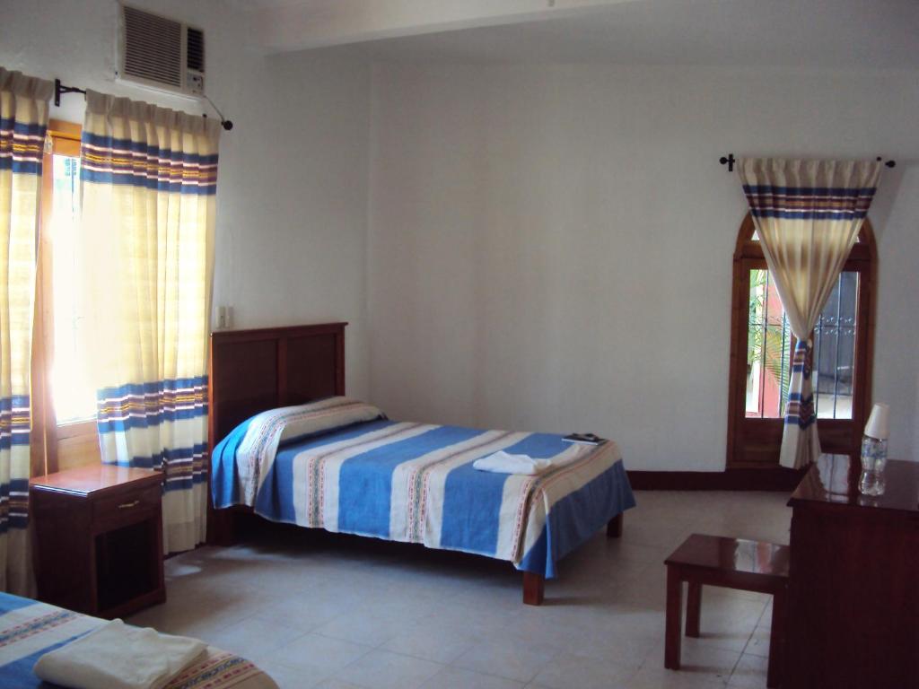 Двухместный (Двухместный номер с 2 двуспальными кроватями) отеля Hotel De Santiago, Чьяпа-де-Корсо