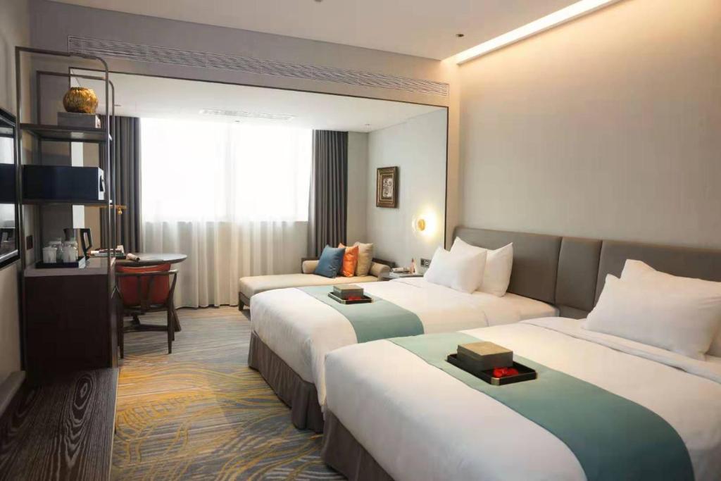 Двухместный (Non Smoking-Elite Twin Bed Room) отеля Dong Fang Hotel Guangzhou, Гуанчжоу