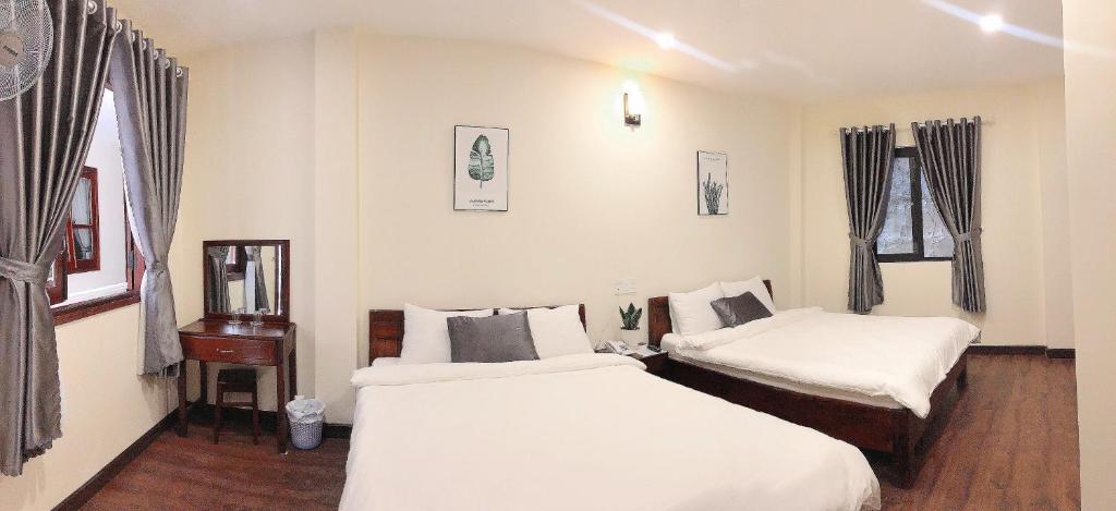 Четырехместный (Улучшенный четырехместный номер) отеля Le Grey Dalat Hotel, Далат