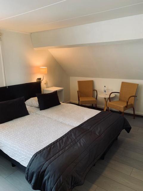 Двухместный (Двухместный номер с 1 кроватью и собственной ванной комнатой) отеля De Herbergier, Маастрихт
