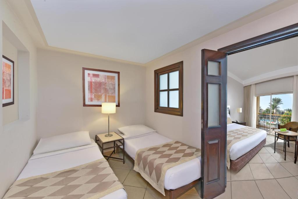Двухместный (Семейный двухместный номер Делюкс с 2 отдельными кроватями – Jaz Mirabel Park) курортного отеля Jaz Mirabel Resort, Шарм-эль-Шейх