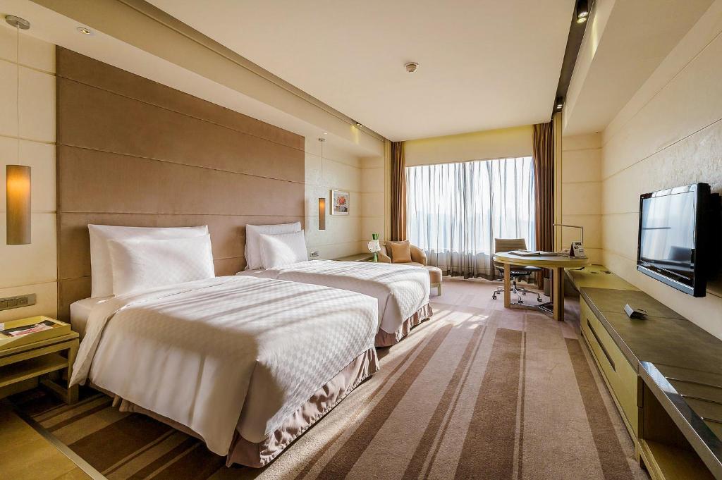 Двухместный (Клубный двухместный номер с 2 отдельными кроватями) отеля Hotel Nikko Saigon, Хошимин