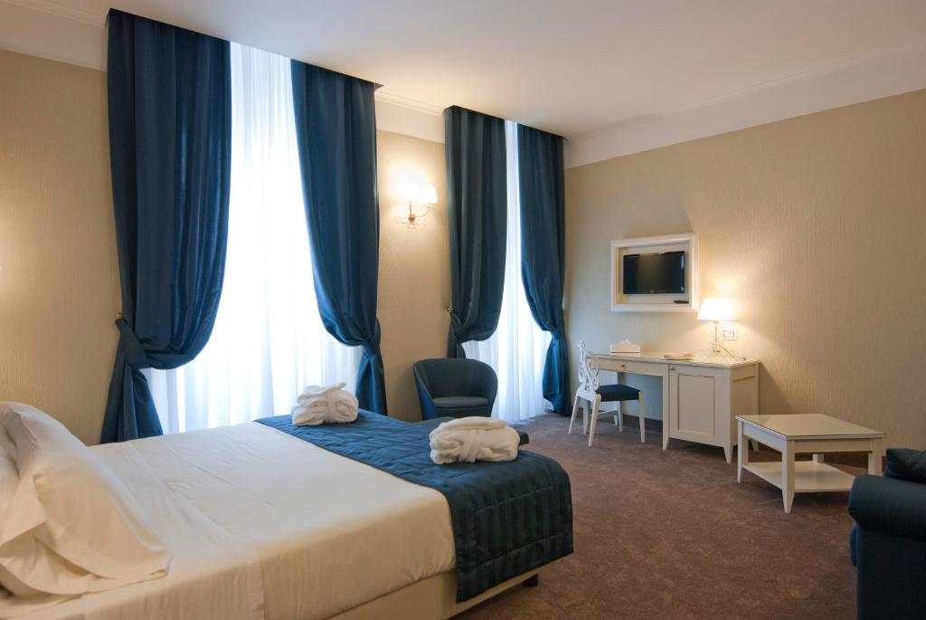 Двухместный (Улучшенный двухместный номер с 1 кроватью или 2 отдельными кроватями) отеля Dei Borgia Hotel, Рим