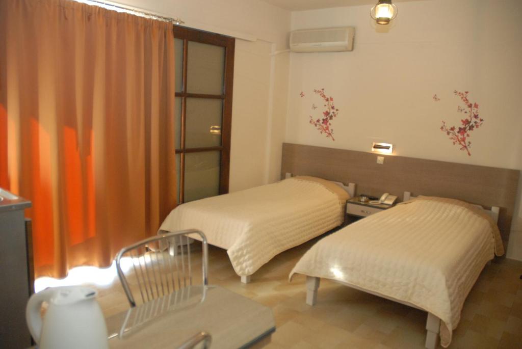 Двухместный (Улучшенный двухместный номер с 2 отдельными кроватями и видом на сад) апартамента Takis Hotel Apartments, Ялиссос