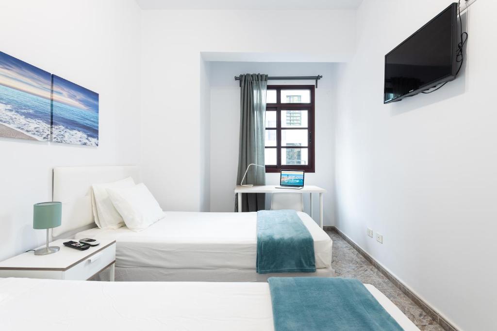 Двухместный (Двухместный номер с 2 отдельными кроватями и общей ванной комнатой) апартамента CoolivingC, Лас-Пальмас-де-Гран-Канария