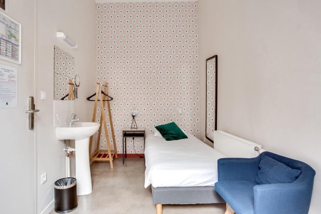 Двухместный (Двухместный номер с 2 отдельными кроватями и общей ванной комнатой) отеля Gastama Hostel, Лилль