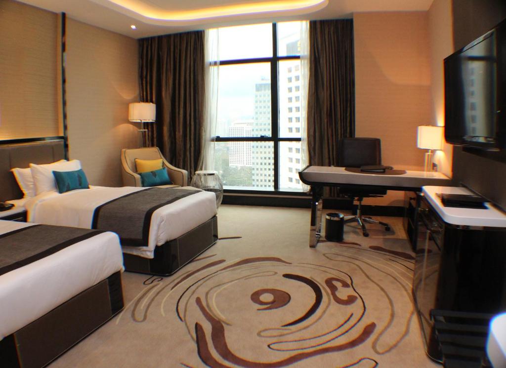 Сьюит (Двухместный суперлюкс «Премьер» с 2 отдельными кроватями) отеля Pacific Regency Hotel Suites, Куала-Лумпур