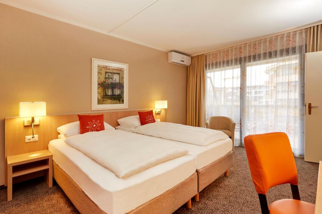 Двухместный (Улучшенный двухместный номер с 1 кроватью) отеля H4 Hotel Arcadia Locarno, Локарно