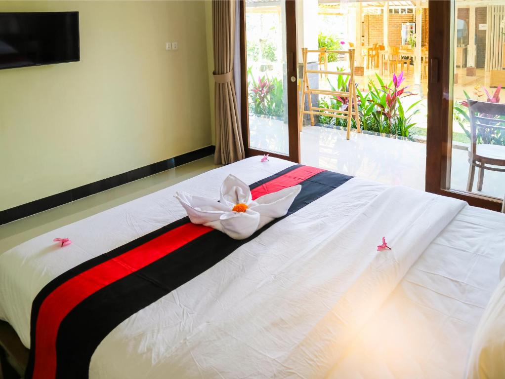 Двухместный (Двухместный номер Делюкс с 1 кроватью или 2 отдельными кроватями) отеля Puri Canggu Rooms ll, Чангу