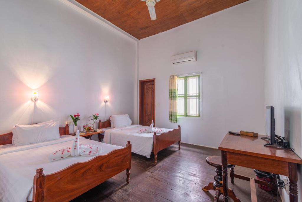 Двухместный (Улучшенный двухместный номер с 2 отдельными кроватями) гостевого дома Five Rose Siem Reap Hostel, Сием Рип