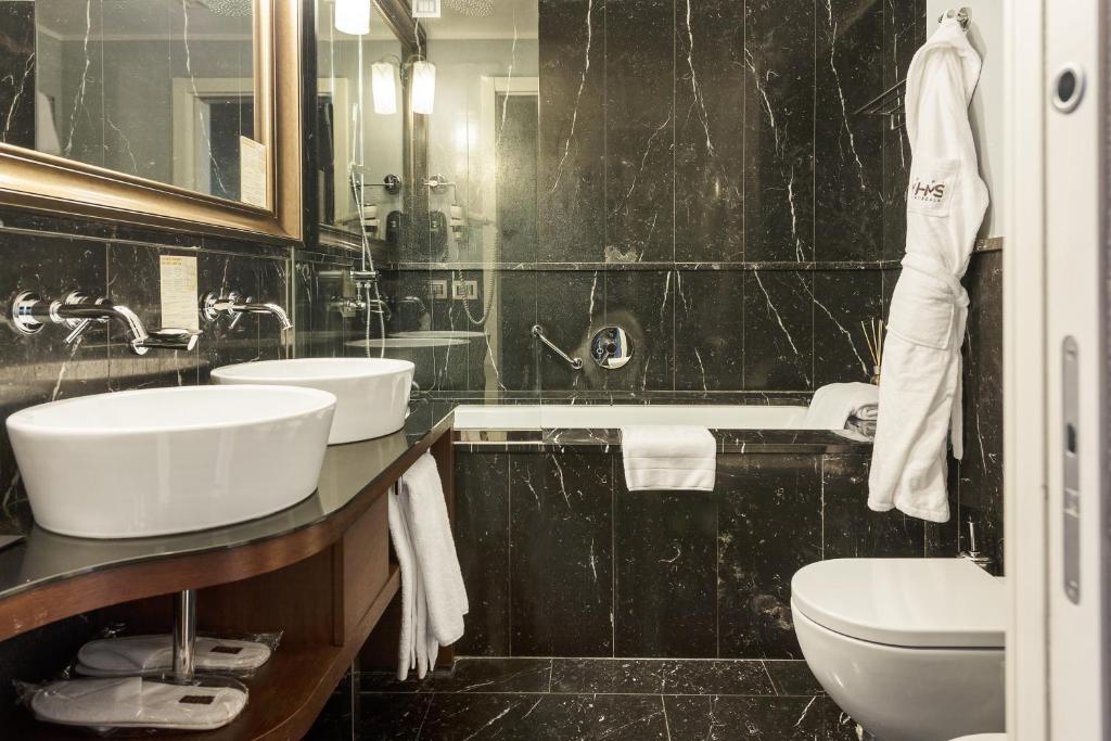Двухместный (Улучшенный двухместный номер с 1 кроватью) отеля Hotel Milano Scala, Милан