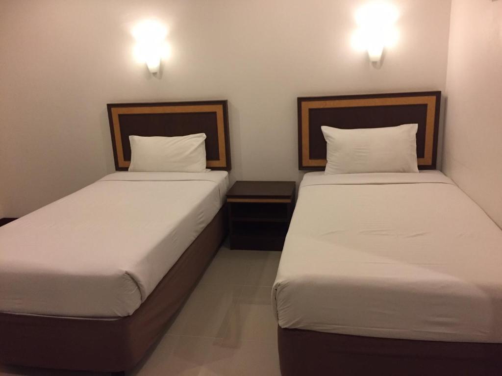 Трехместный (Стандартный трехместный номер) отеля KP hotel, Удонтхани