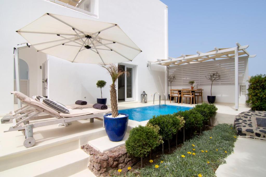 Сьюит (Вилла Junior с открытым бассейном и панорамным видом) отеля Santorini Secret Suites & Spa, Оя