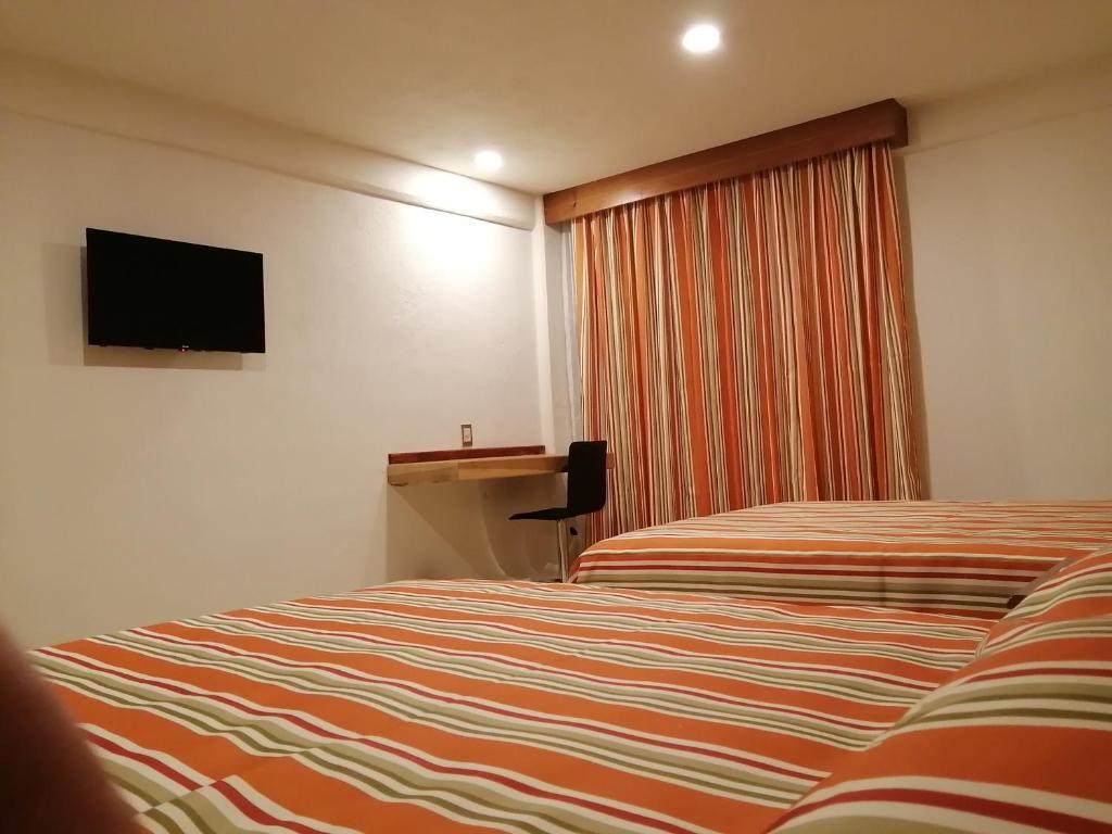Двухместный (Двухместный номер с 2 отдельными кроватями) отеля Misol-Ha Hotel, Мерида
