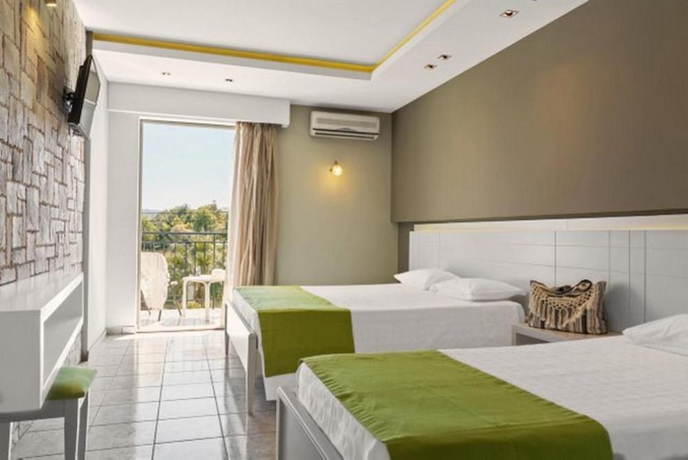 Трехместный (Стандартный трехместный номер) отеля Margarita Hotel - All Inclusive, Лаганас