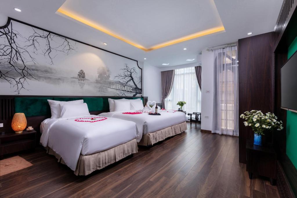 Четырехместный (Четырехместный номер с собственной ванной комнатой) отеля Hanoi Lullaby Hotel and Travel, Ханой