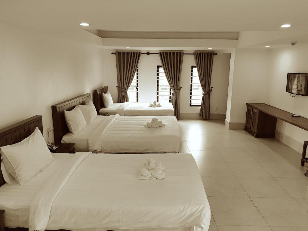 Семейный (Семейный номер Делюкс) отеля Angkor City View Hotel, Сием Рип