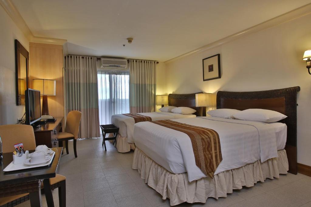 Сьюит (Люкс с 1 спальней) отеля Crown Regency Suites Mactan, Мактан