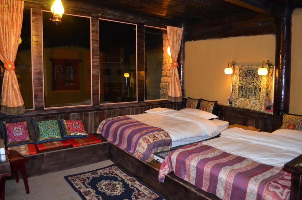 Двухместный (Двухместный номер Делюкс с 2 отдельными кроватями) гостевого дома Timeless Inn, Шангри-Ла (Тибет)