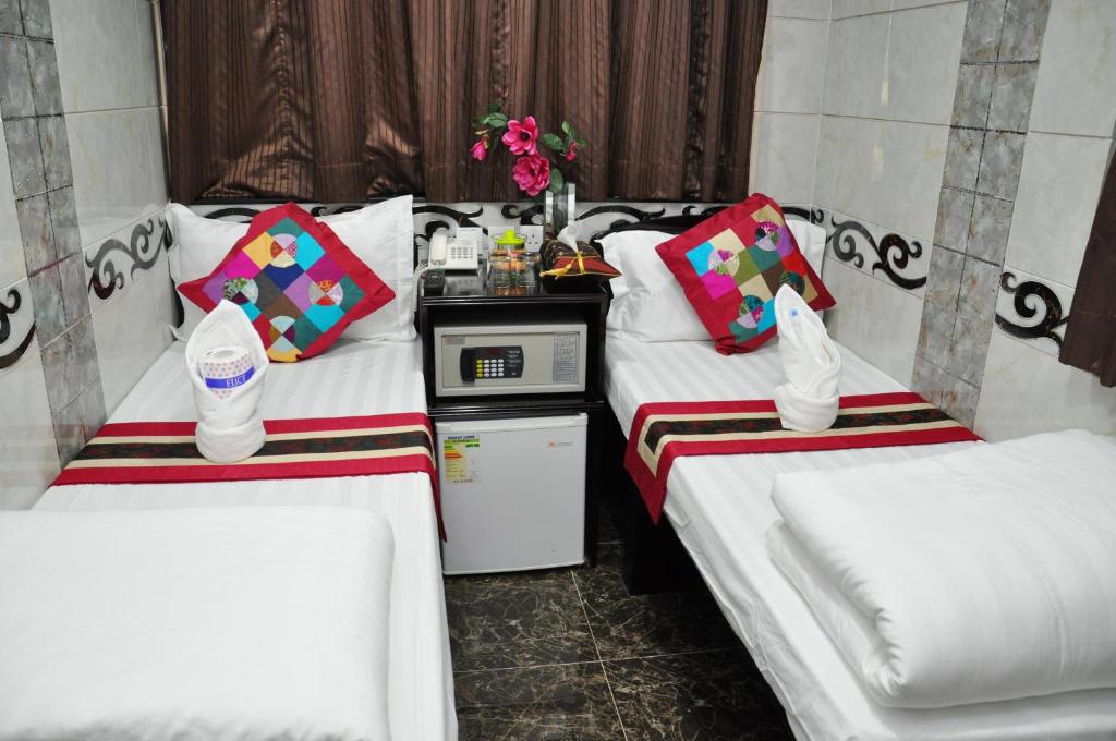 Двухместный (Двухместный номер с 2 отдельными кроватями) гостевого дома Pearl Premium Guest House(10/F), Гонконг (город)