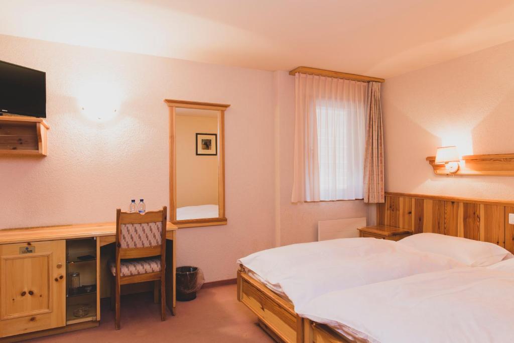 Двухместный (Небольшой двухместный номер с 1 кроватью) отеля Hotel Europe, Гриманс
