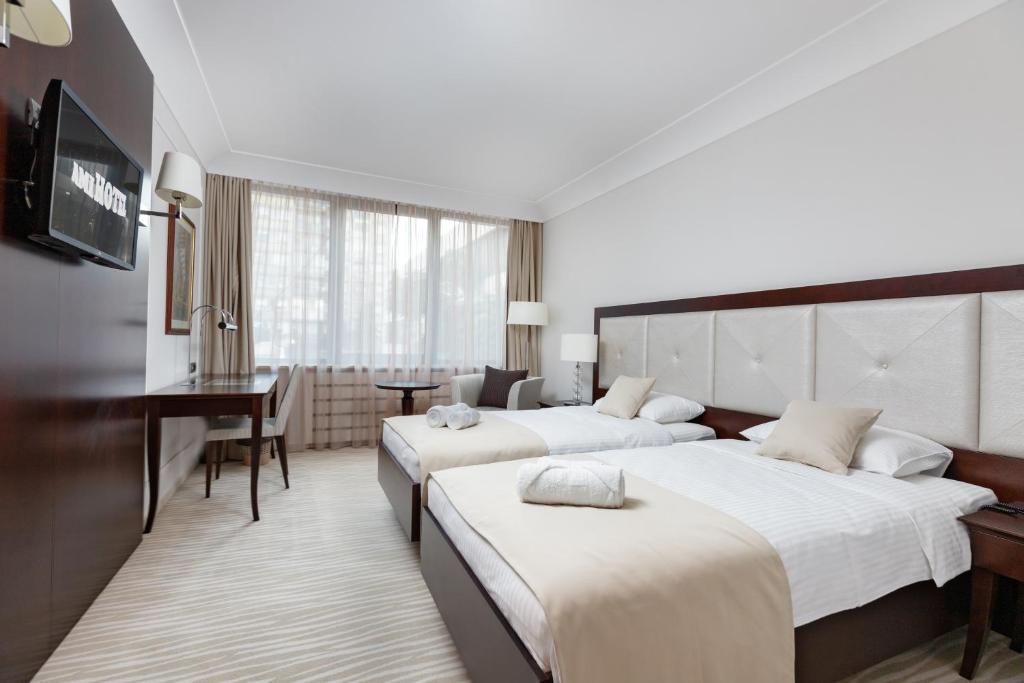 Двухместный (Двухместный номер с 2 отдельными кроватями) отеля GARNI HOTEL AMI, Нови-Сад