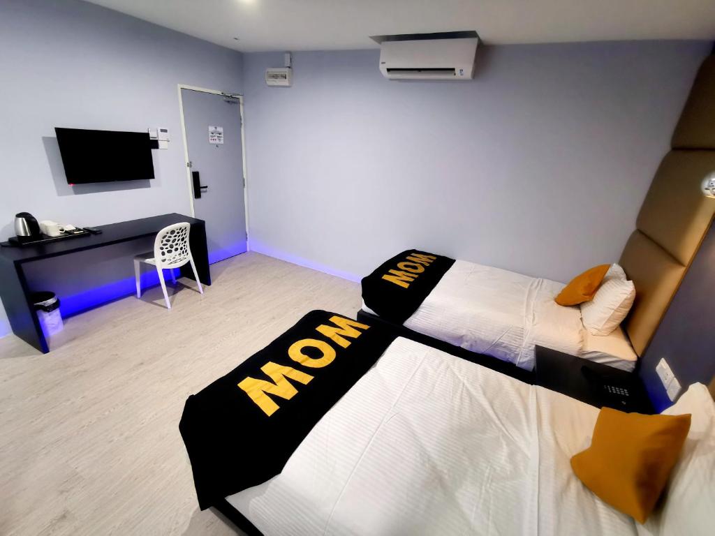 Двухместный (Стандартный двухместный номер с 2 отдельными кроватями) отеля WOW Hotel Penang, Джорджтаун
