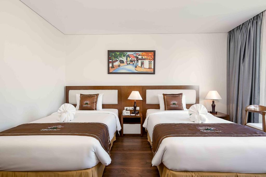 Двухместный (Двухместный номер Делюкс с 2 отдельными кроватями и видом на океан) отеля Tamarind Hotel, Дананг