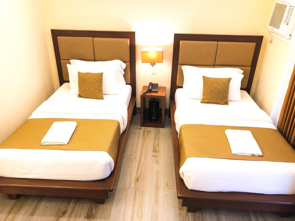Двухместный (Стандартный двухместный номер с 2 отдельными кроватями) отеля The Piccolo Hotel of Boracay, Боракай