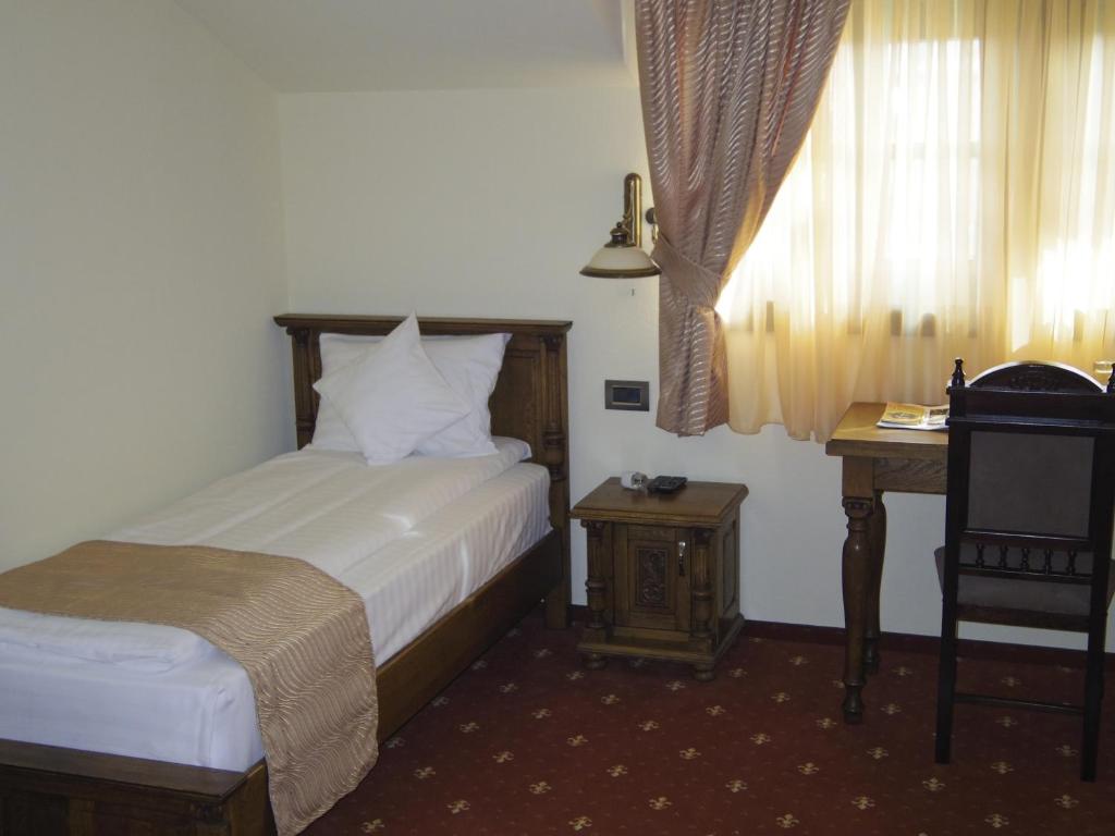 Двухместный (Двухместный номер с 2 отдельными кроватями) отеля Hotel Castel Royal, Тимишоара