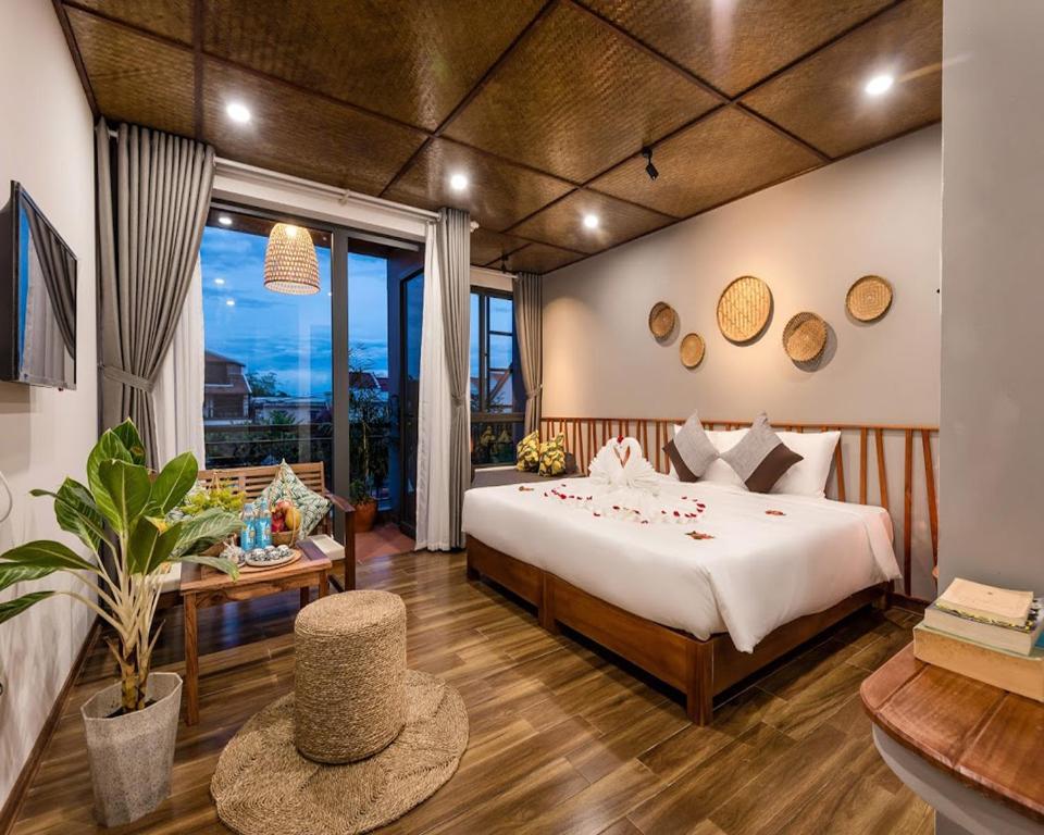 Двухместный (Двухместный номер Делюкс с 1 кроватью) виллы Tropical Home Villa, Хойан