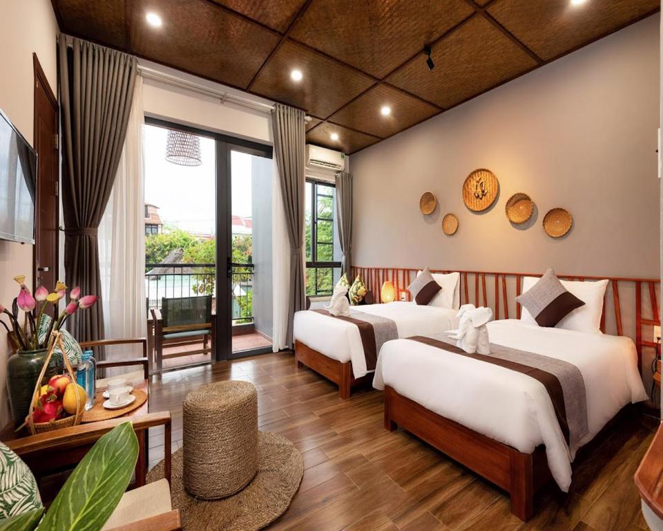 Двухместный (Двухместный номер Делюкс с 2 отдельными кроватями) виллы Tropical Home Villa, Хойан