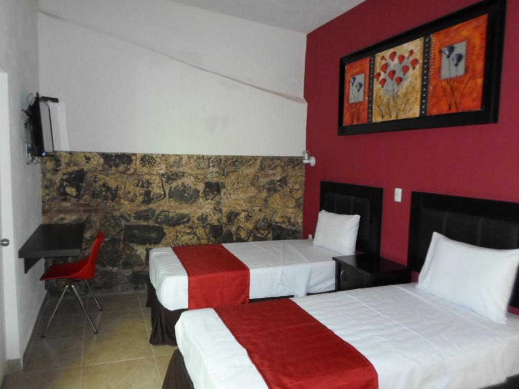 Двухместный (Двухместный номер с 2 отдельными кроватями) отеля Hotel Montroi City, Колима